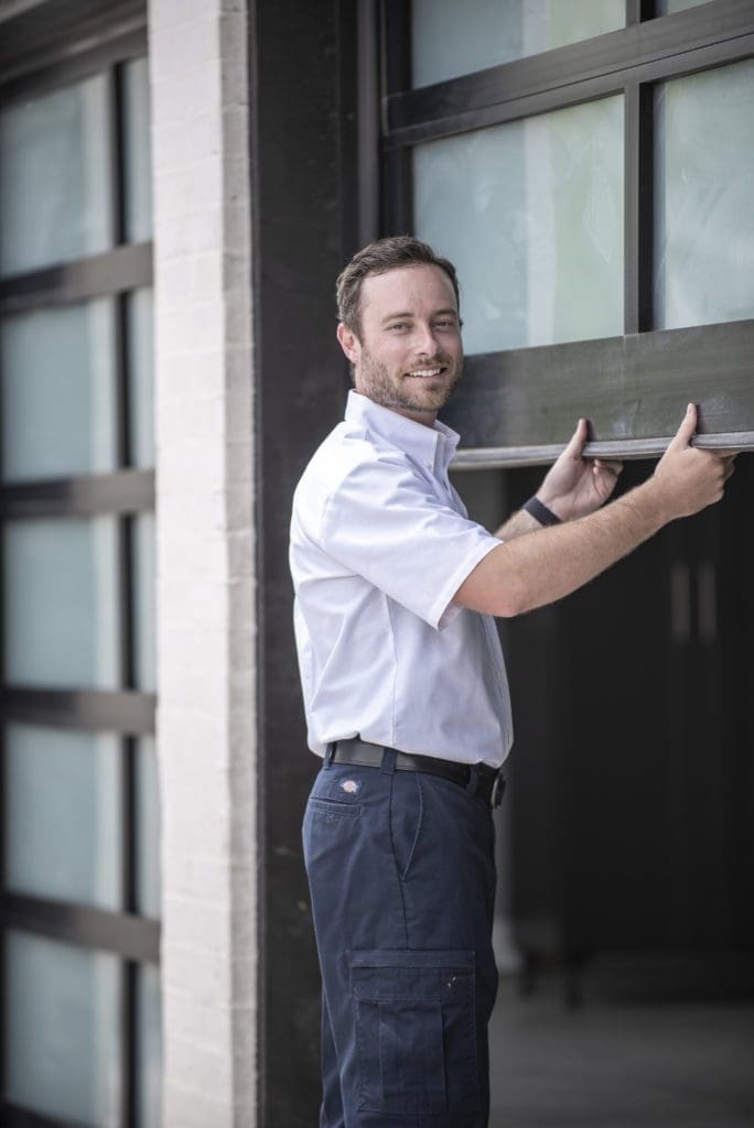 Welborn Technician working on garage